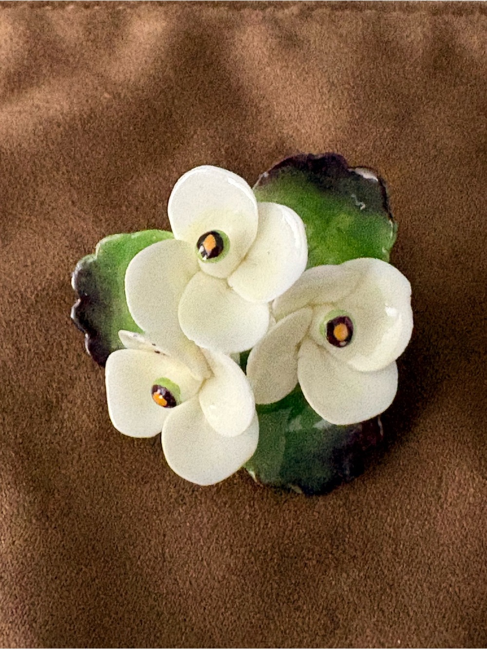 White Enamel Floral Cluster Brooch with Green Leaf Accents - Cara Ceramics